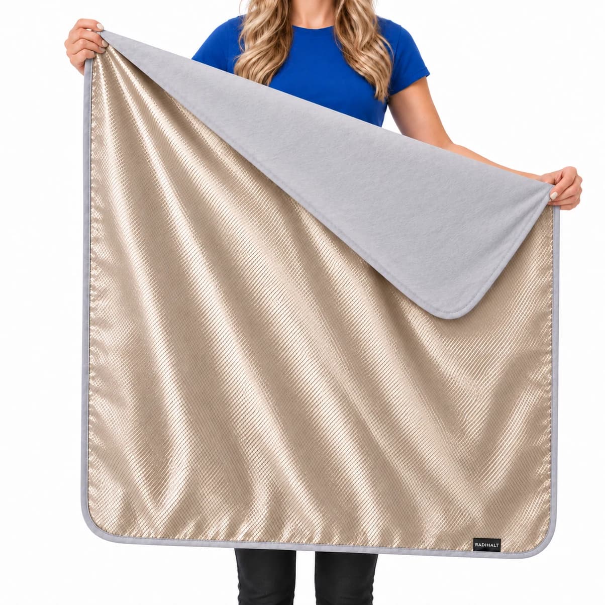 RADIHALT 36 × 30 inch grey blanket held open, showing the cotton face and copper-nickel inner fabric