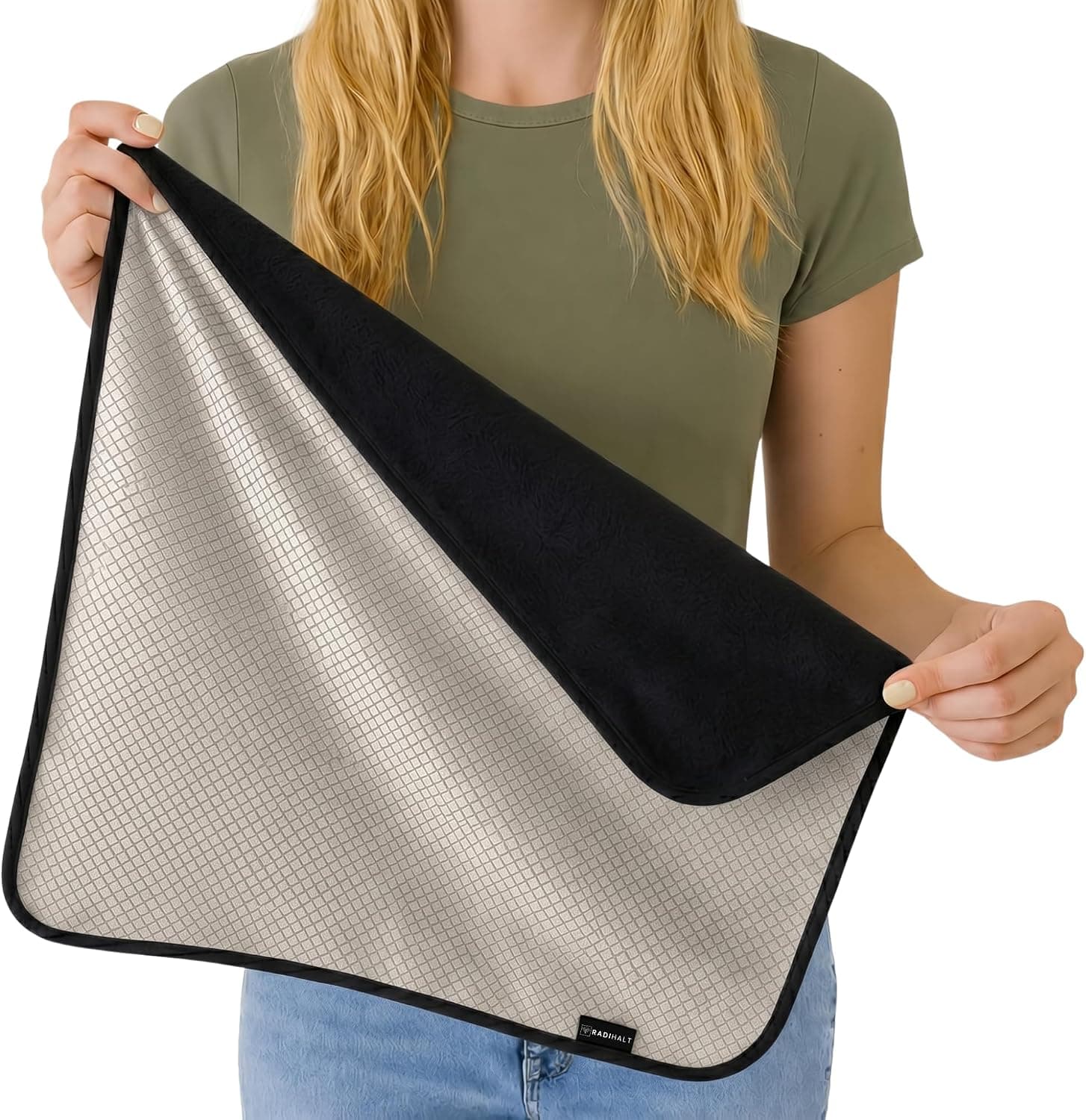 RADIHALT Compact blanket in black, held open to show its cotton face and copper-nickel fabric reverse