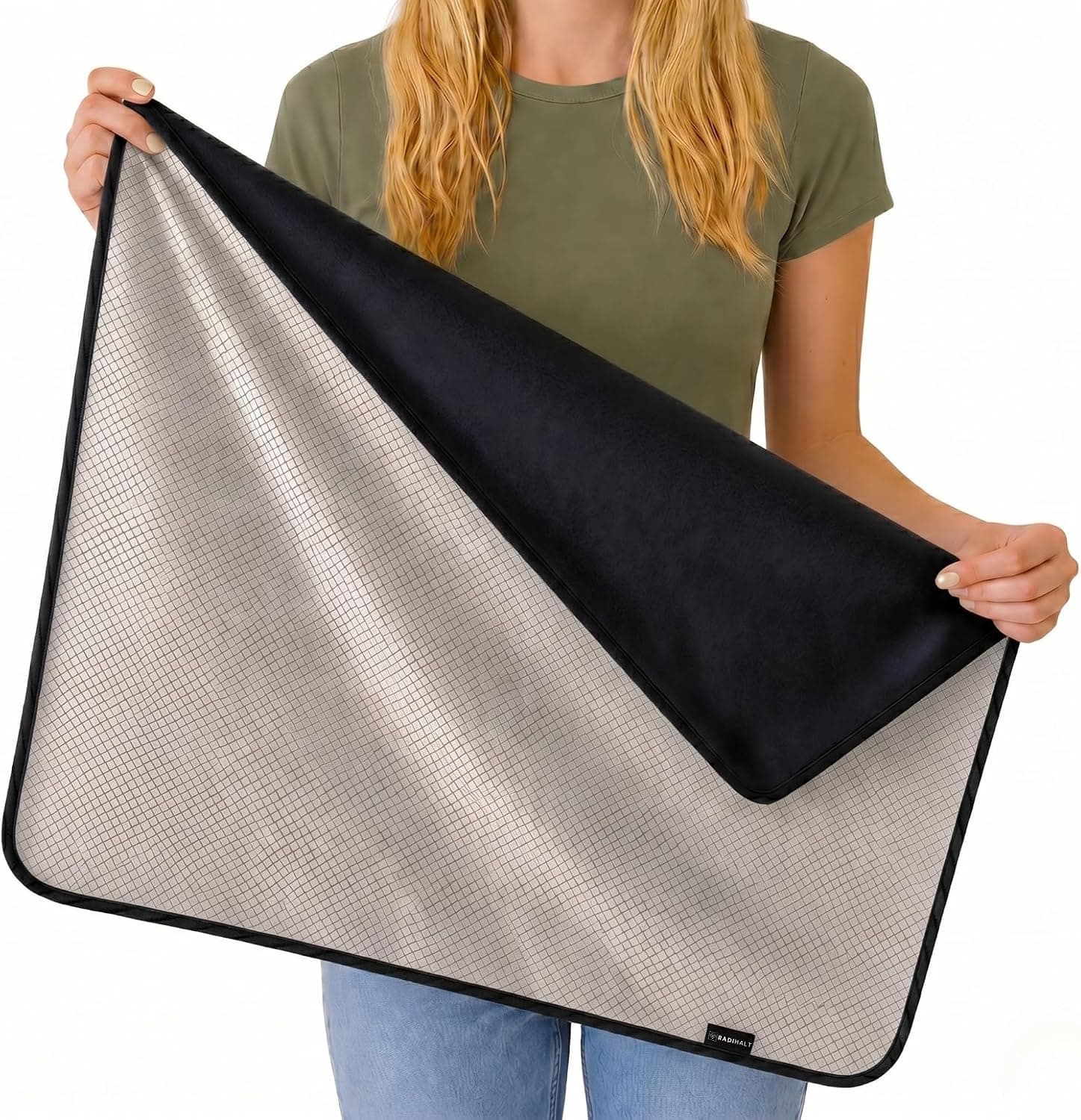 RADIHALT Full Lap blanket in black, held open to show its cotton face and copper-nickel fabric reverse